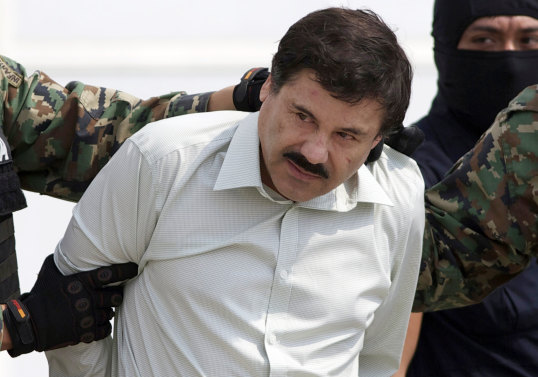 Radden Keefe’s darker pieces include one about Joaquin “El Chapo” Guzman, seen here following his capture in 2014.