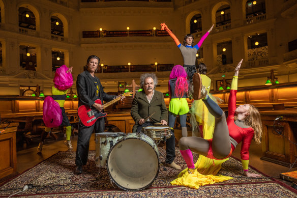 Emmett Kelly (guitar), Jim White (drums) and Jo Lloyd (far right) with dancers in the State Library of Victoria’s Reading Room.