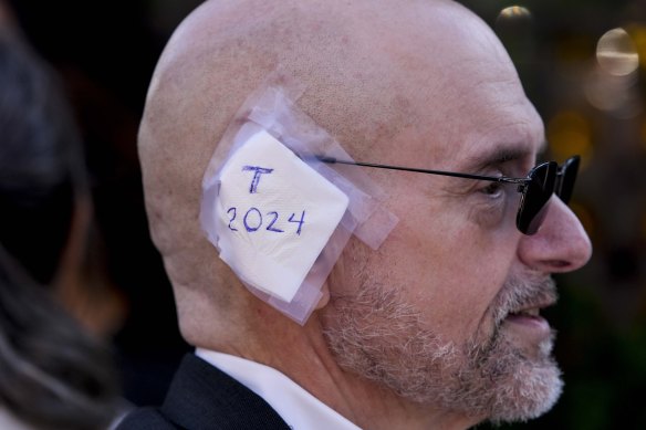 Some Republican convention attendees sport bandages in solidarity with Trump. 