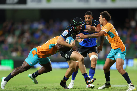 Ollie Callan of the Force runs the ball during the round 3 match.