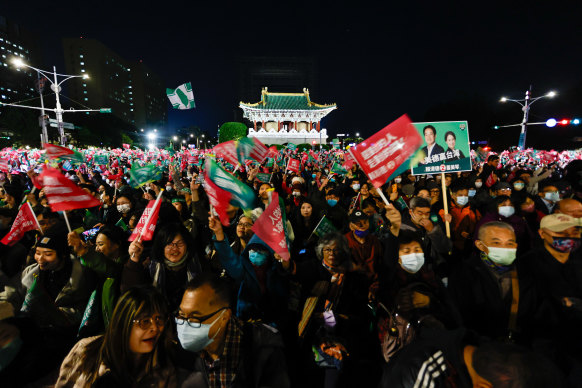 Democratic Progressive Party supporters attend a political rally in Taipei on Thursday. 