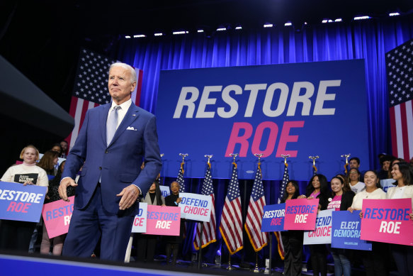 US President Joe Biden arrives to speak during a Democratic National Committee event at the Howard Theatre.