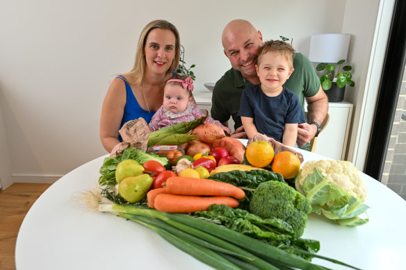 Loretta Woollard and husband Scott Woollard and children Matteo and Emelia with their order from Farmers Pick.