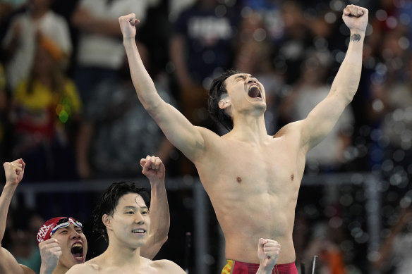 China celebrate their win in the men’s medley relay.