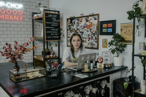 Olya, the manager, at the Chop-Chop Barbershop in Moscow.