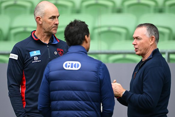 Melbourne coach Steven King and football boss Alan Richardson in conversation with NSW State of Origin coach Laurie Daley at AAMI Park earlier in the week.