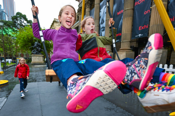 The giant eight-metre swing erected for all comers to play on proved an irresistible draw for youngsters Sabine and Meliha.