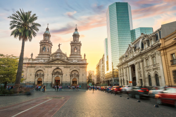 Plaza de Armas Square and Santiago Metropolitan Cathedral at sunset - Santiago, Chile.