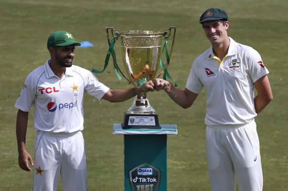 Pakistan skipper Babar Azam and counterpart Pat Cummins with the Benaud-Qadir Trophy.