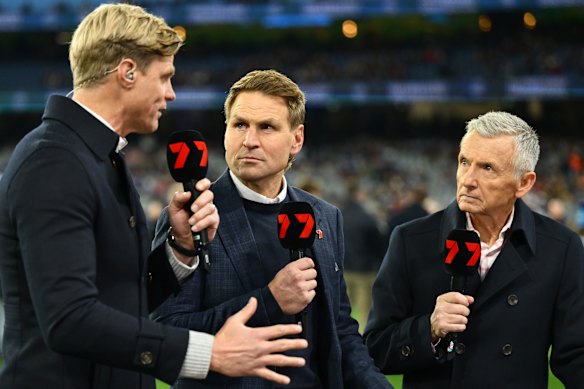 Cornes on air for Channel Seven alongside Nick Riewoldt (left) and Bruce McAvaney (right).