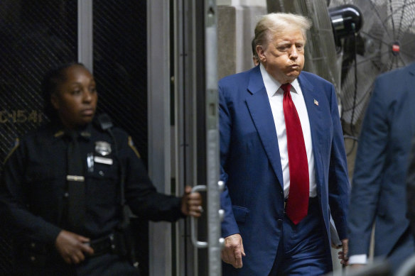 Former US president Donald Trump appears at the Manhattan criminal court before his trial in New York on Tuesday.