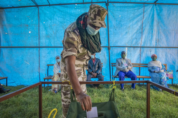 A September 9 photo of a member of the Tigray Special Forces casting his vote in a local election in the regional capital Mekelle.