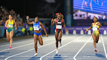 Adaejah Hodge of British Virgin Islands, second left, and Shaniqua Bascombe of Trinidad and Tobago, second right, compete in the Women’s 200m Final at the Commonwealth Games in Glasgow, Scotland, Friday, July 31, 2026. (AP Photo/Kin Cheung).