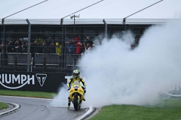 Australian Jack Miller performs a burnout on Sunday to keep the fans happy.