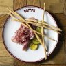 Moran Family Farm salami, zuni pickles and grissini.