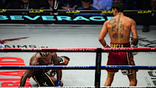 Ryan Garcia knocks down Conor Benn.