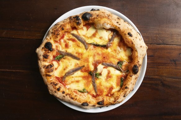 Margherita, the queen of pizzas, with anchovies. 