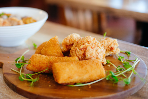 Indonesian risoles: soft crepes filled with a chicken ragaout that are breaded and fried.