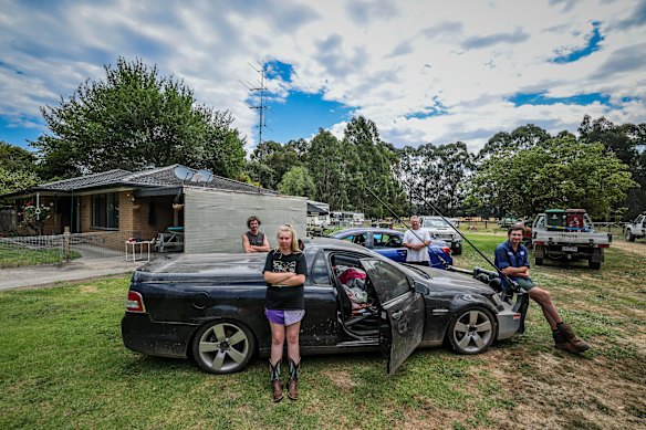 Bailey, Nala, Wayne and Hayden of the Clissold family preparing to defend their property on Tuesday at Carlisle River in the Otway National Park.