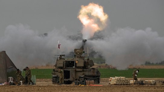 An Israeli mobile artillery unit fires a shell from southern Israel towards the Gaza Strip on Sunday.