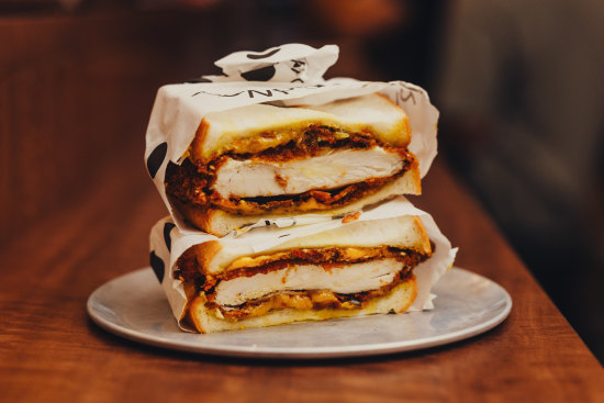 Sesame fried chicken, cheese, pickled zucchini and curry mayo sandwich.