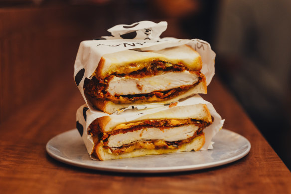 Sesame fried chicken, cheese, pickled zucchini and curry mayo sandwich.