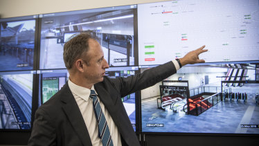 Transport Secretary Rodd Staples in the operations control centre for the metro line at Rouse Hill.