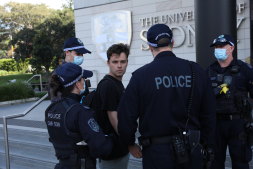 Students and university staff protest at the government's proposed fee rises and the university’s staff cuts at the University of Sydney on Wednesday.