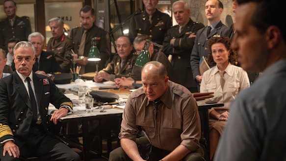 In the crucial hours before the D-Day invasion, General Dwight D. Einsenhower (Brendan Fraser), centre, with private secretary Kay Summersby (Kerry Condon) and Scottish meteorologist James Stagg (Andrew Scott), right.