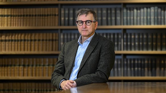 Administrator Marking Irving, centre, has been forced to hire private security as he faces pressure, and danger, in his task to clean-up the CFMEU.