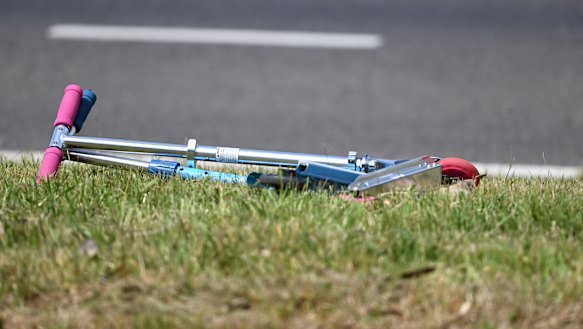 A child’s scooter at the scene of the crash in October 2024.
