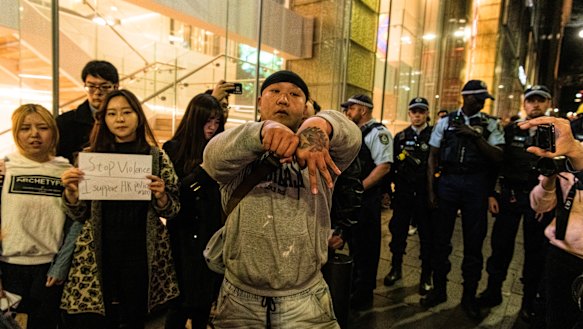 Pro-China supporters sang the Chinese national anthem and said they disagreed with statements said by the Hong Kong protesters.