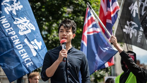 Activist Finn Lau speaks at a rally for Hong Kong democracy in London. 