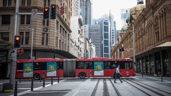 Normally busy streets are quiet in Sydney and Melbourne as commuters work from home and visitors stay in.