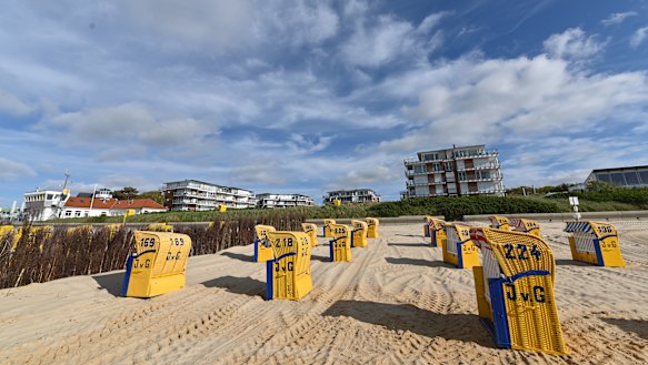 Beach chairs stand ready for tourists at Duhne beach near the coastal town of Cuxhaven, Germany. 