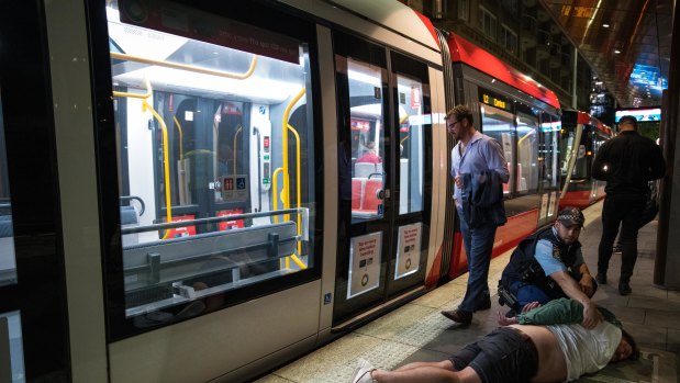 Police arrested a 30-year-old man at the Bridge Street tram stop after he was refused entry to the Establishment Bar on George Street.