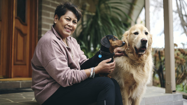 Nill Kyrgios outside the family’s Canberra home with Nick’s two dogs, Quincy and King.