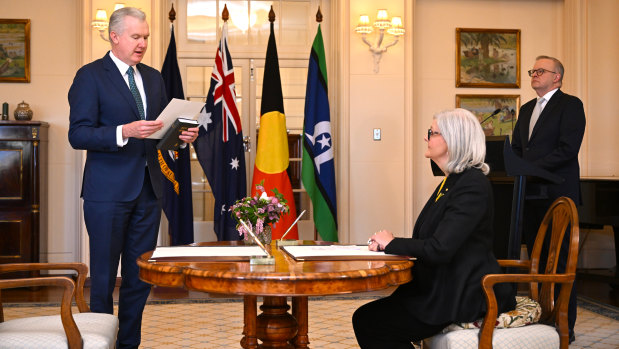 Australian Home Affairs Minister and Immigration Minister Tony Burke is sworn in by Australian Governor-General Sam Mostyn during the Federal ministry swearing in ceremony at Government House in Canberra.