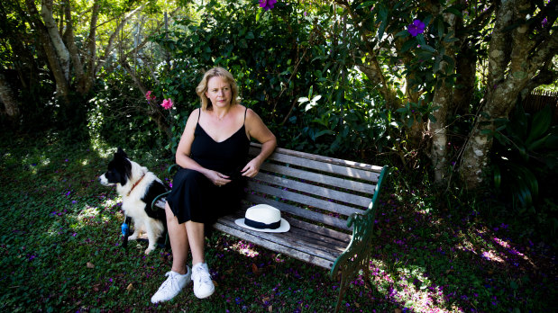 Gabrielle Rogers in the garden of her Tamborine Mountain home shared with husband Andrew Jack.