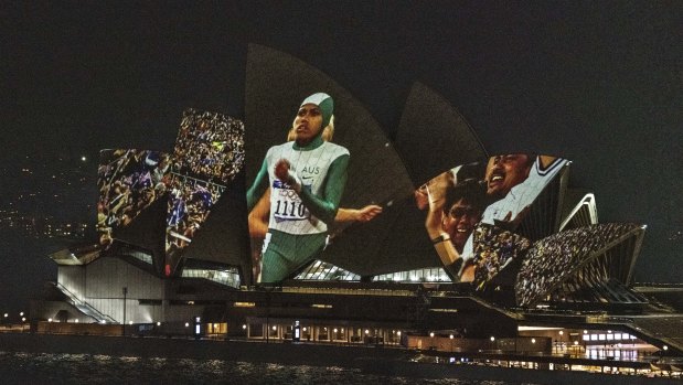Cathy Freeman's Olympic gold winning 400m race from the 2000 Sydney Olympics is projected onto the Sydney Opera House.