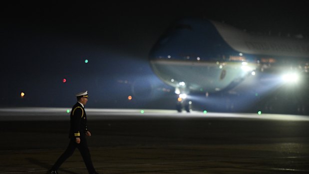 Air Force One lands  in the UK carrying the leader of a country one in three Britons named as a threat.