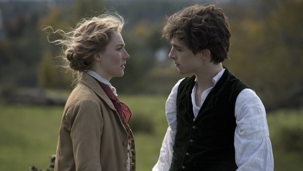 Saoirse Ronan as Jo and Timothee Chalamet as Laurie in Little Women.