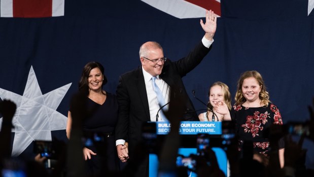 Scott Morrison with his family, claiming victory in the ballroom of the Sofitel Wentworth in Sydney. 