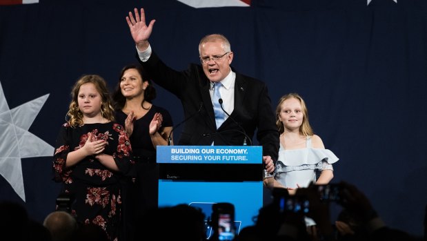 A victorious Scott Morrison  takes to the stage on election night.