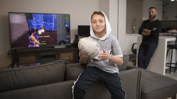 Nedal, now 11 years old, and his father Walid Chemaisse.