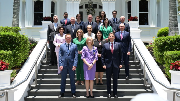 Queensland Premier Steven Miles (left front) is seen with his new ministers outside Government House in Brisbane.