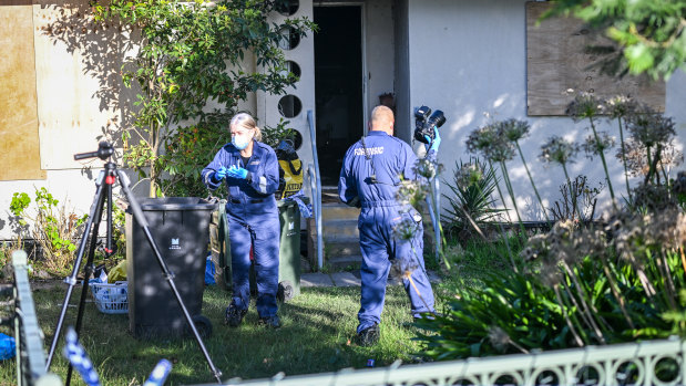 Forensic officers investigate the fatal incident at Chadstone in July.