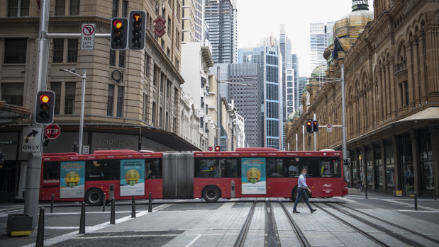 Normally busy streets are quiet in Sydney and Melbourne as commuters work from home and visitors stay in.