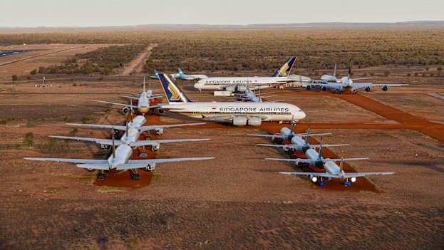 Airbus A380s, Boeing MAX 8s and other smaller aircraft grounded at a storage facility in Alice Springs in 2020 because of the coronavirus pandemic.