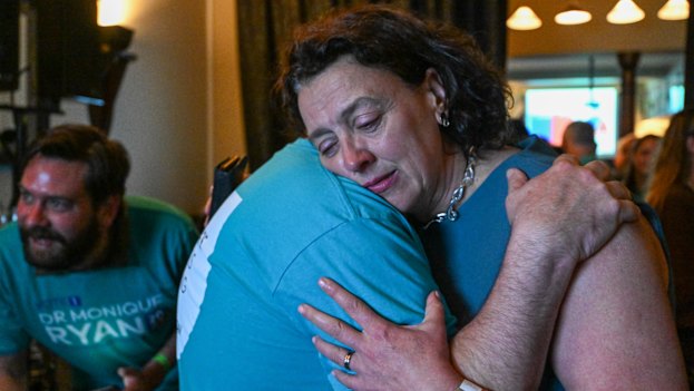 Ryan embracing her brother Peter on election night, remembering Peter’s son Hector, who died in 2017, hours after his VCE exams. Ryan was the first to their house at 3am that night and took Peter and his wife Cate to the Coroner’s Court to identify Hector’s body.